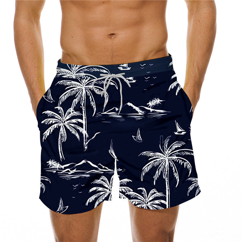 Navy blue swim shorts with white palm tree and beach scene pattern on a white background