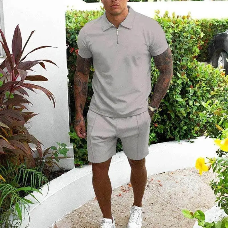 Men's casual two-piece grey T-shirt and shorts set from ZA-Zola, outdoor garden setting