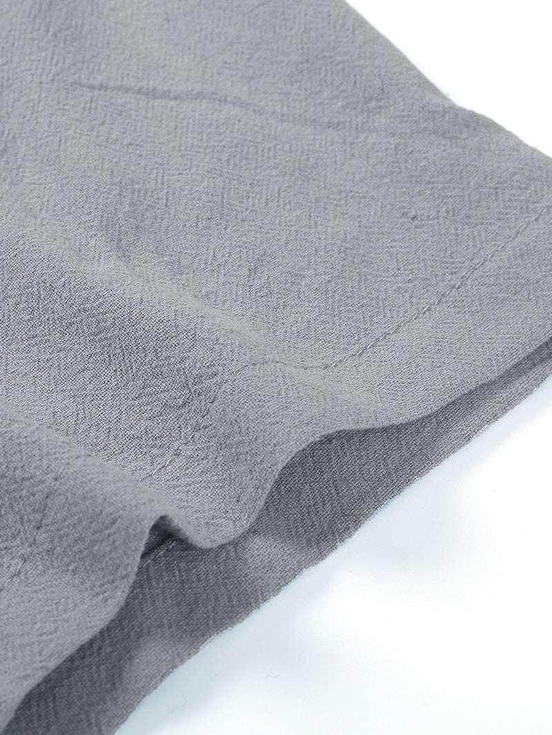 Close-up of light grey linen cotton fabric from ZA-Zola men's beach shirt.