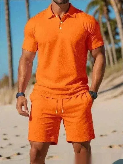 Man wearing bright orange mesh polo shirt and shorts set on a sunny beach, ZA-Zola fashion