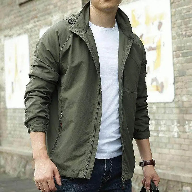Men’s solid waterproof outdoor jacket in olive green from ZA-Zola, styled casually on city street