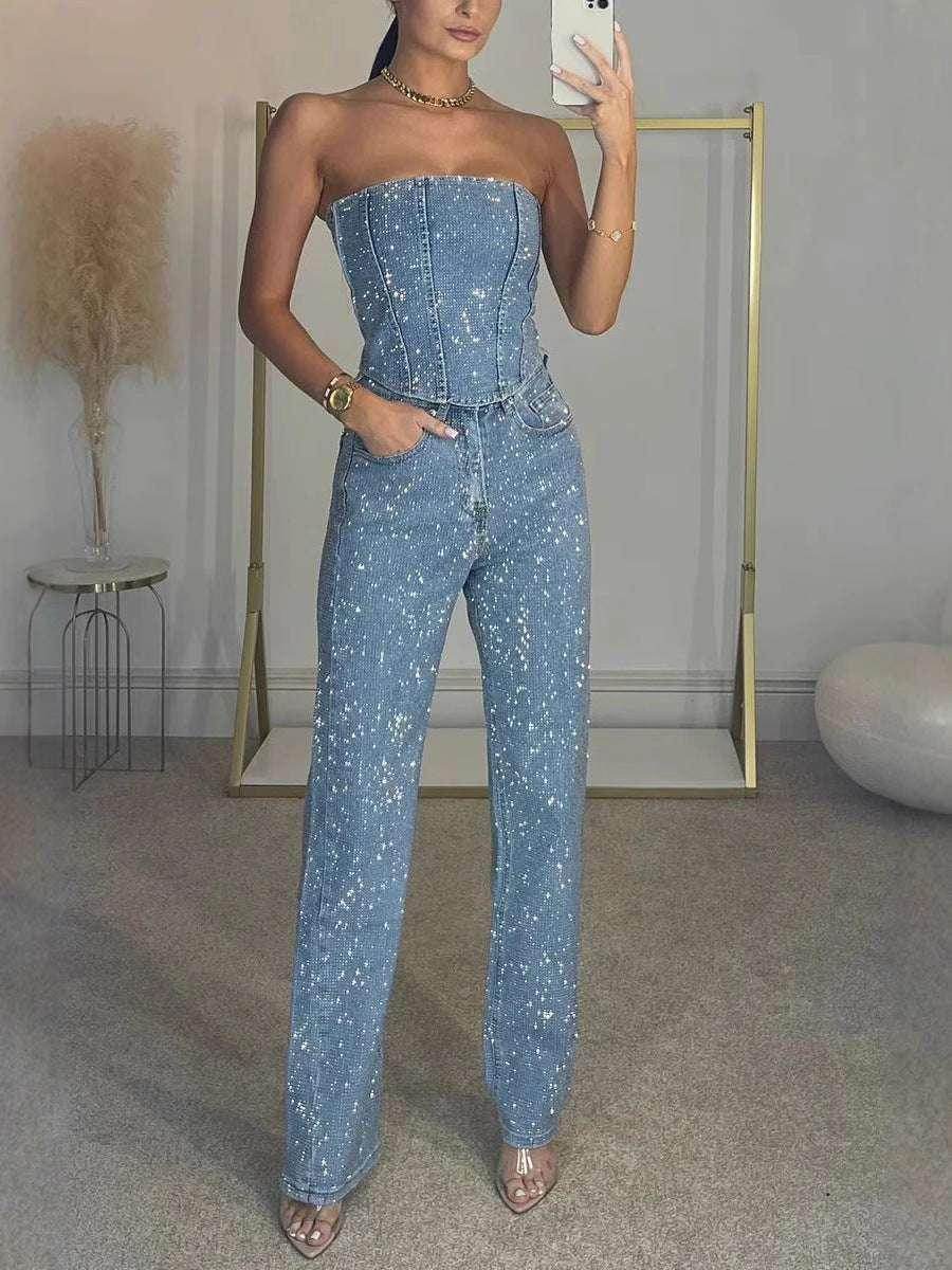 Woman wearing a strapless denim jumpsuit with gold jewelry, trendy ZA-Zola fashion style
