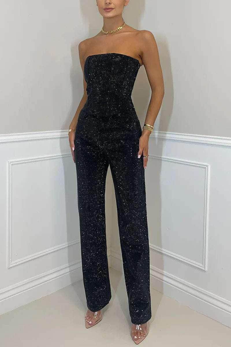 Woman in chic strapless black sequin jumpsuit from ZA-Zola, stylish fashion apparel