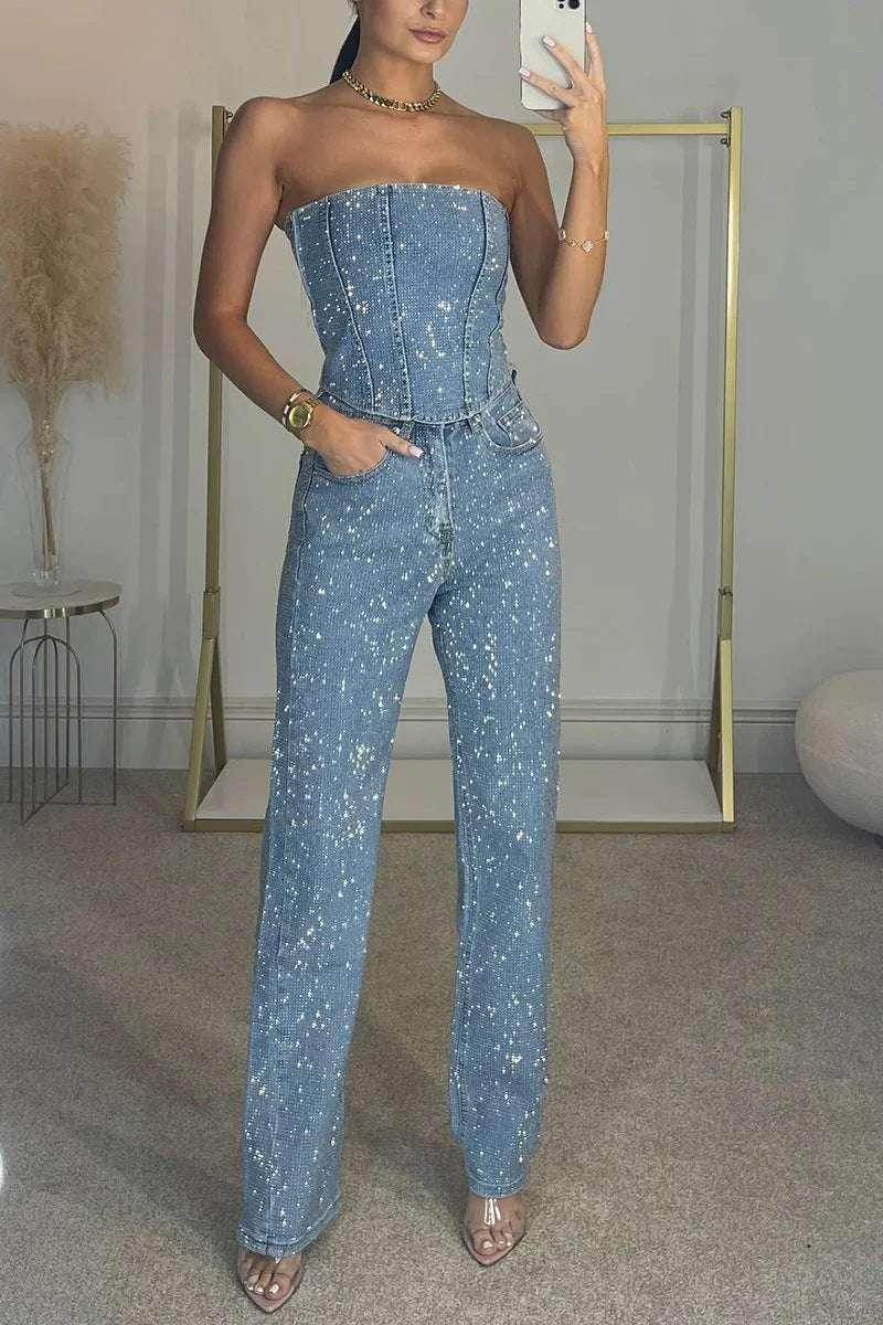 Woman in trendy ZA-Zola blue glitter denim strapless jumpsuit taking mirror selfie