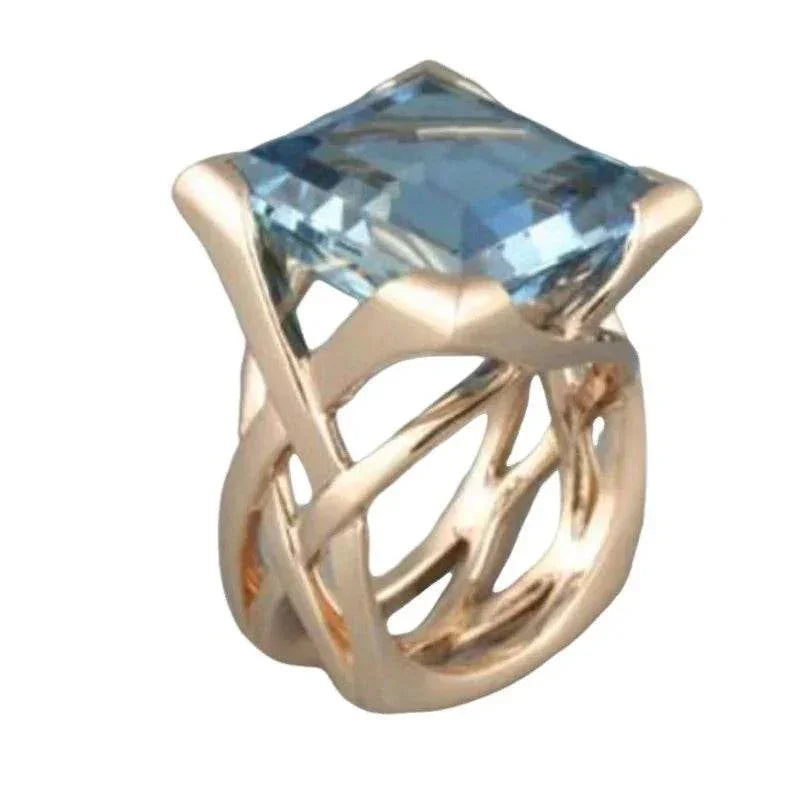 Gold Hollow Ring with Blue Stone – Unisex INS Style - ZA-Zola