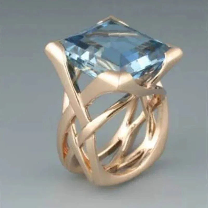 Gold Hollow Ring with Blue Stone – Unisex INS Style - ZA-Zola