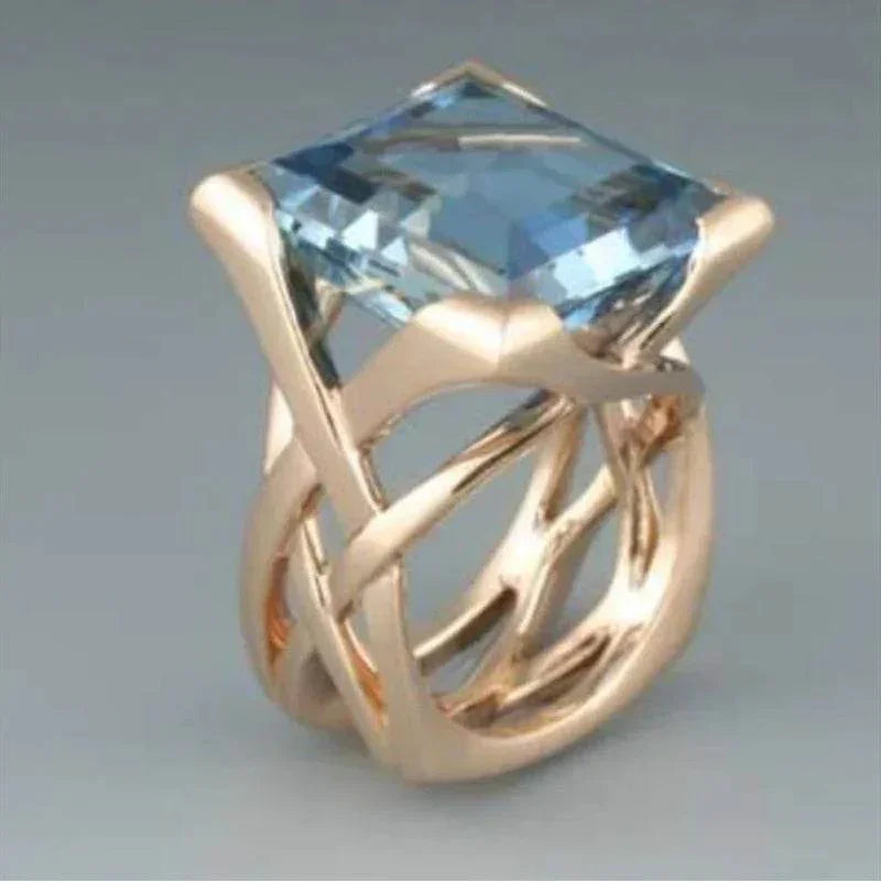 Gold Hollow Ring with Blue Stone – Unisex INS Style - ZA-Zola