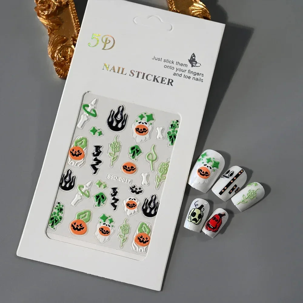 Halloween-themed 5D nail stickers with pumpkins, ghosts, and vibrant designs on artificial nails