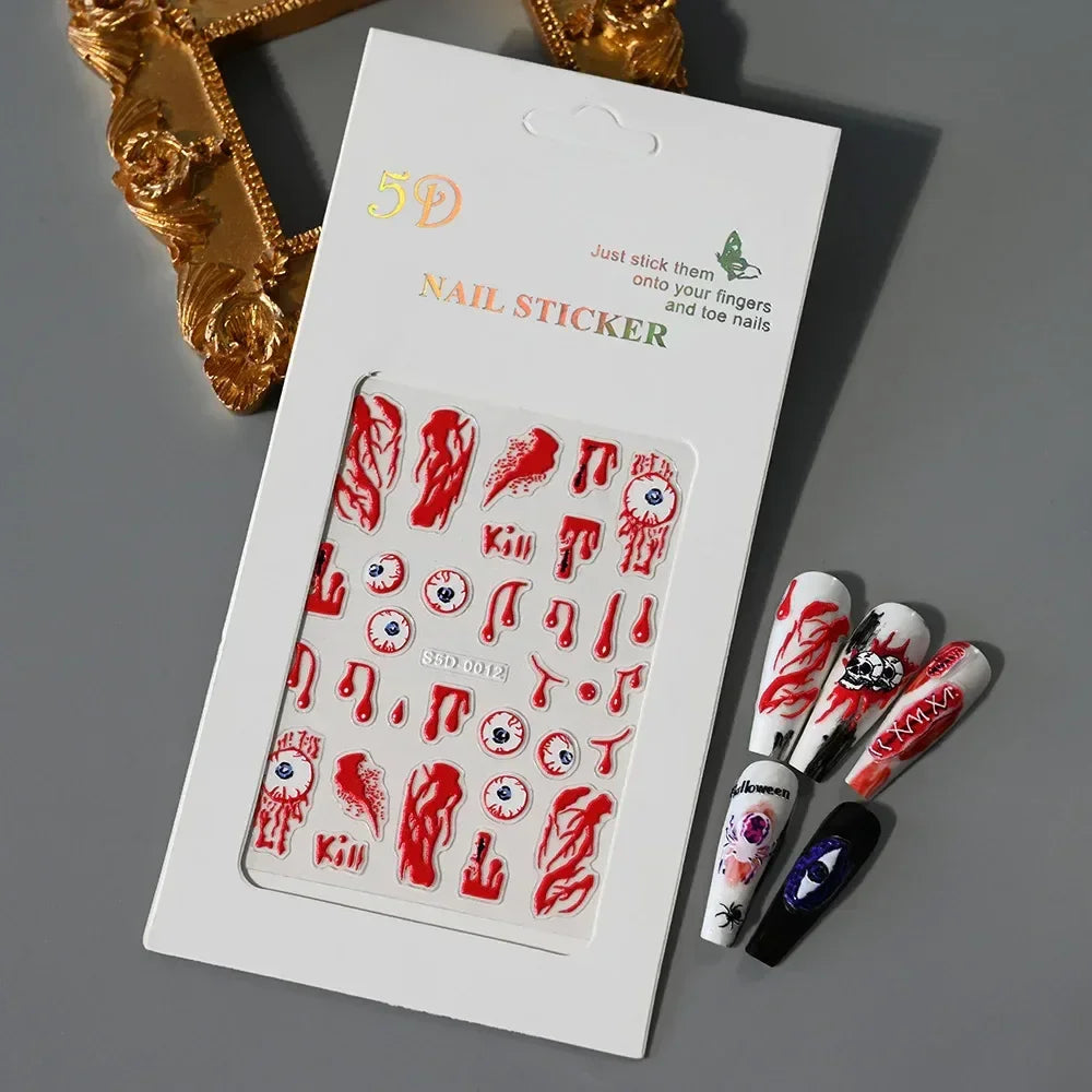 Halloween horror nail stickers with blood, eyeballs, and spooky designs on a white card