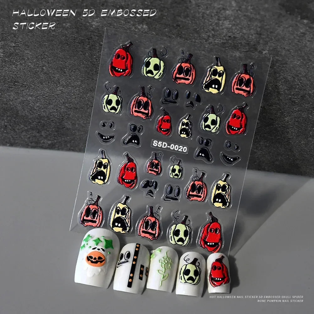 Halloween 5D embossed nail stickers with spooky pumpkin and skull designs on a display sheet.