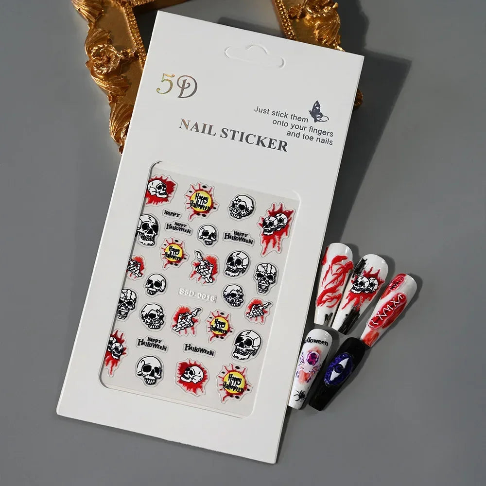 Halloween skull nail stickers with red and black designs, sample art on artificial nails