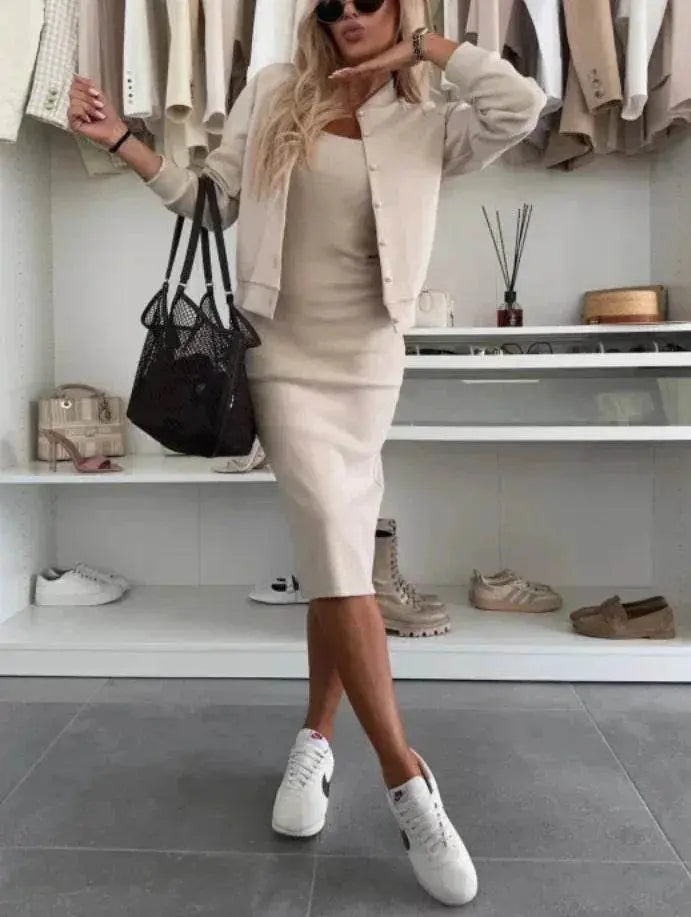 Woman modeling beige sling dress and cardigan set from ZA-Zola, paired with sneakers and tote bag
