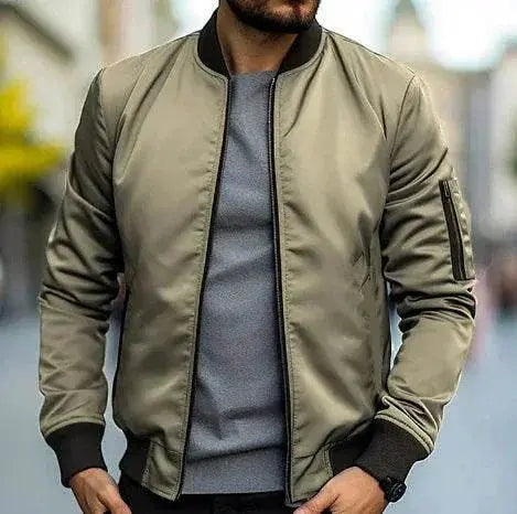Man wearing slim fit wrinkle-resistant bomber jacket and crew neck shirt, ZA-Zola fashion.