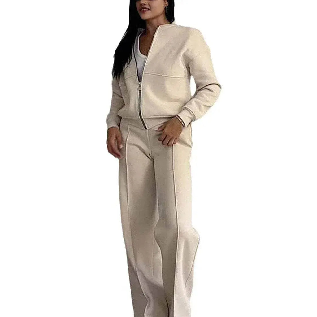 Woman wearing beige zipper jacket and wide leg pants set from ZA-Zola fashion
