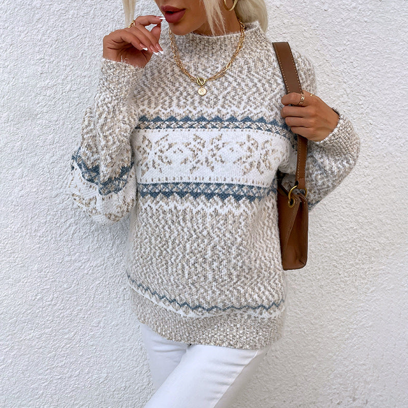Woman wearing a patterned sweater against a white background