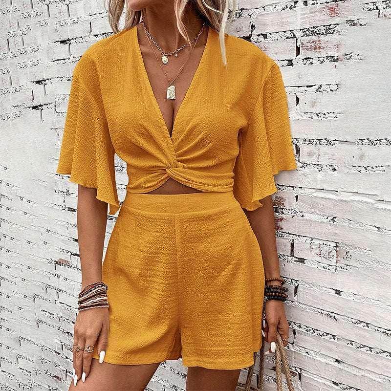 Woman wearing mustard yellow two-piece set, trendy summer fashion from ZA-Zola UK