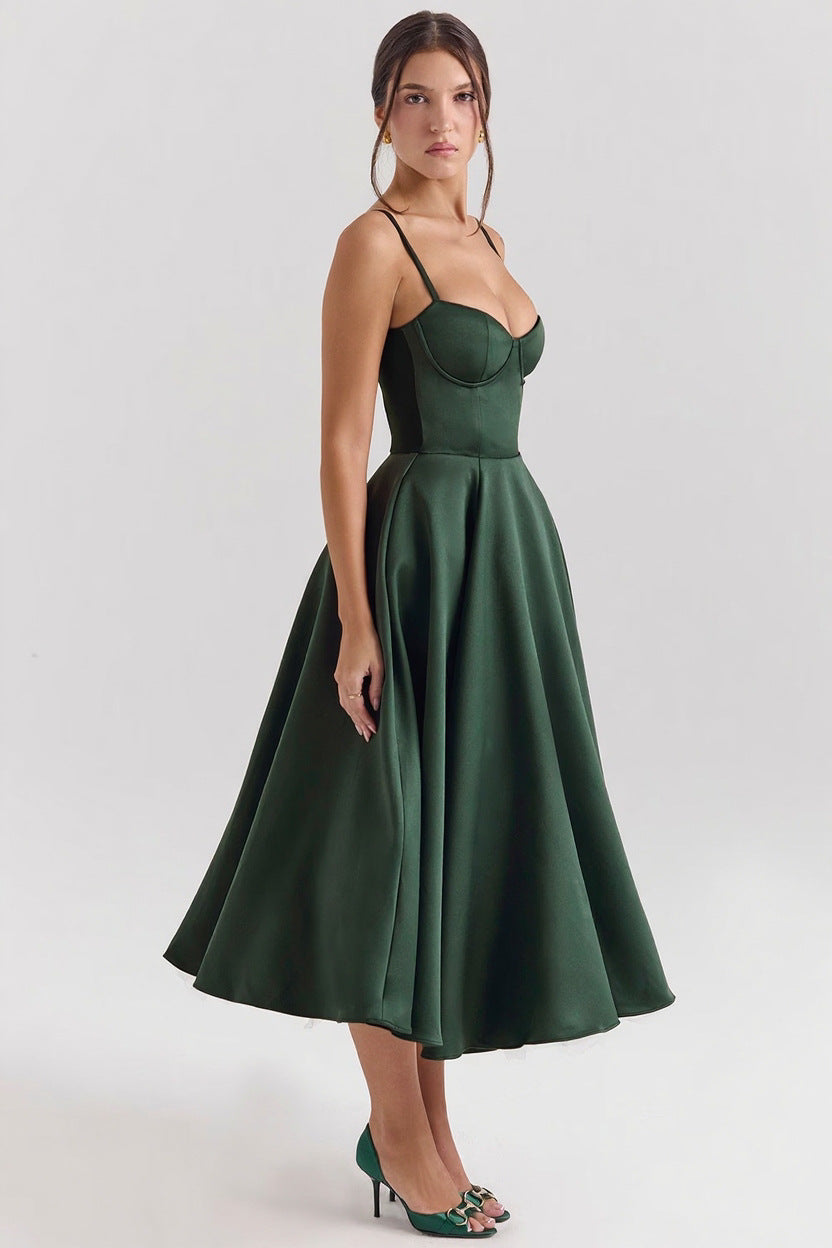 Woman wearing a green dress on a white background
