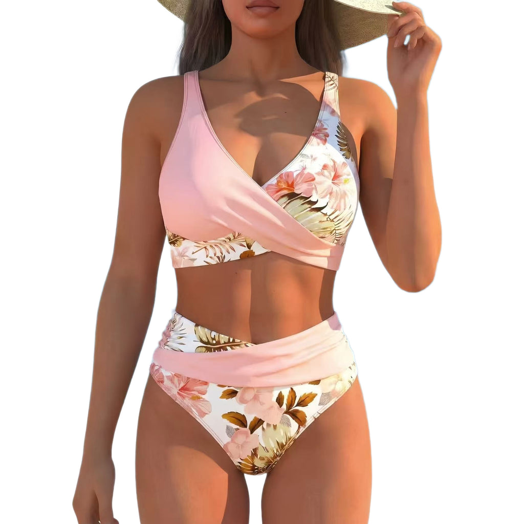 Woman wearing a floral two-piece swimsuit on a white background
