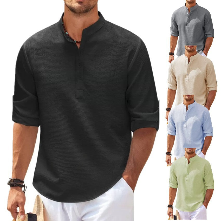 Black short-sleeve shirt worn by a man with additional color options displayed.