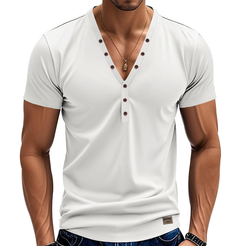 White short-sleeve shirt with brown buttons worn by a person on a white background