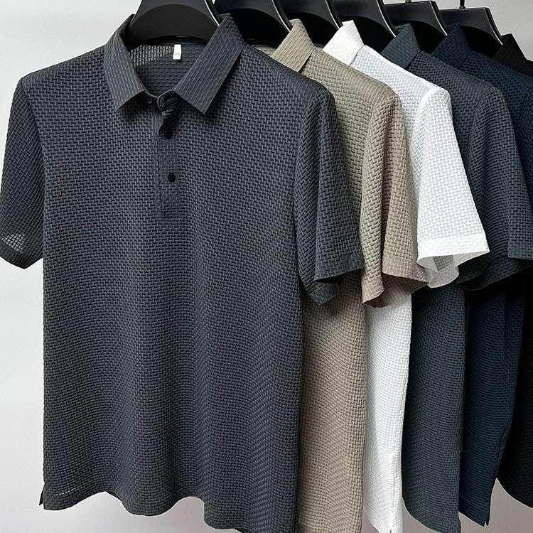 Textured men's polo shirts in various neutral colors on hangers, ZA-Zola fashion apparel.
