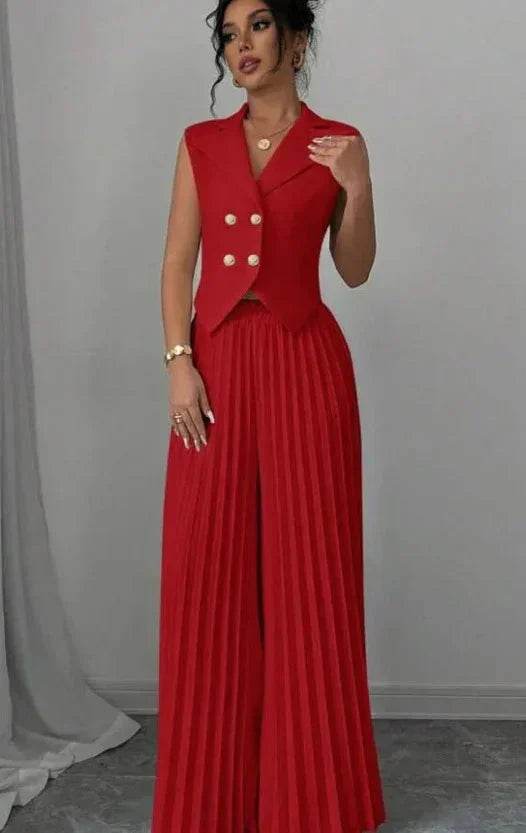 Woman wearing sleeveless red pleated jumpsuit with gold buttons, ZA-Zola fashion