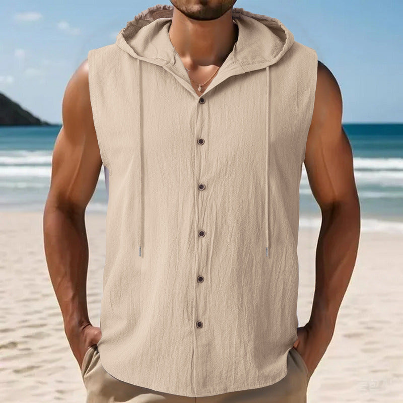 Man wearing a beige sleeveless hoodie on a beach