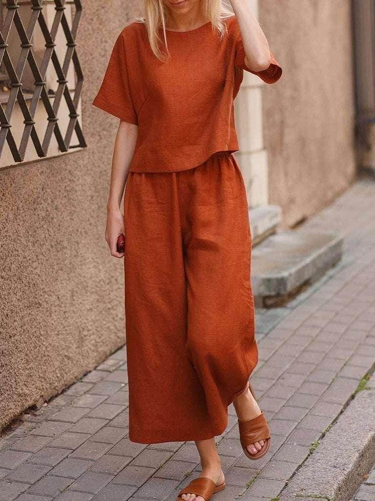 Woman in rust-colored linen two-piece set and sandals, ZA-Zola chic street fashion