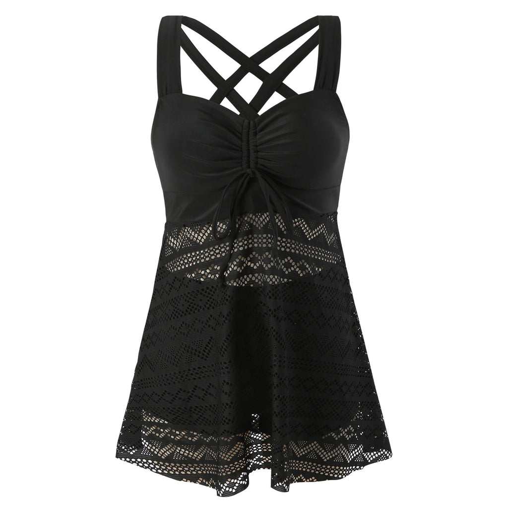 Black lace tank top with criss-cross straps on a white background