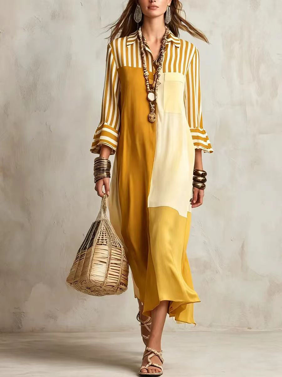 Woman wearing a yellow and white striped dress holding a woven bag against a neutral background