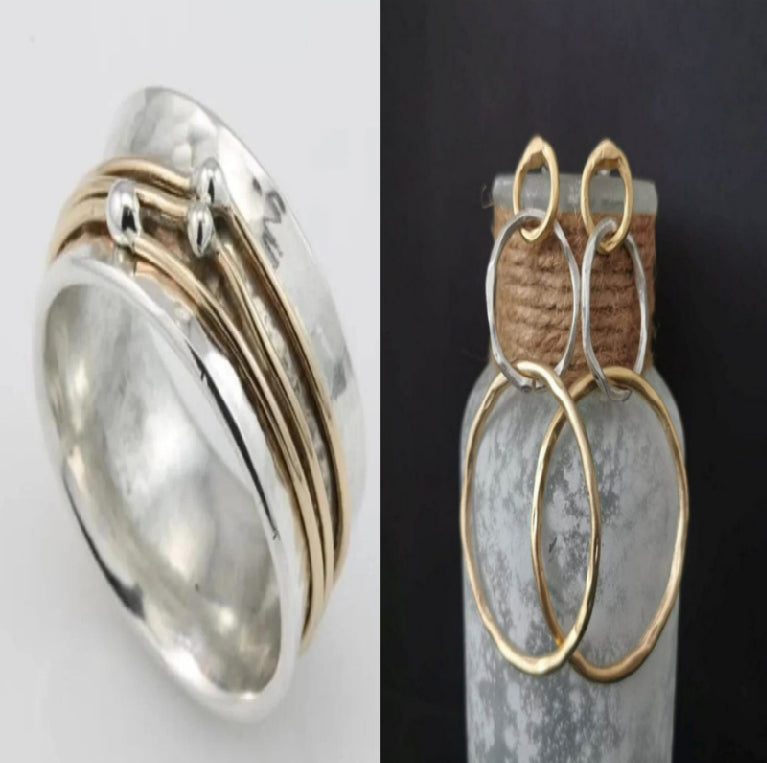 Silver and gold ring on a white background with earrings on a dark background.