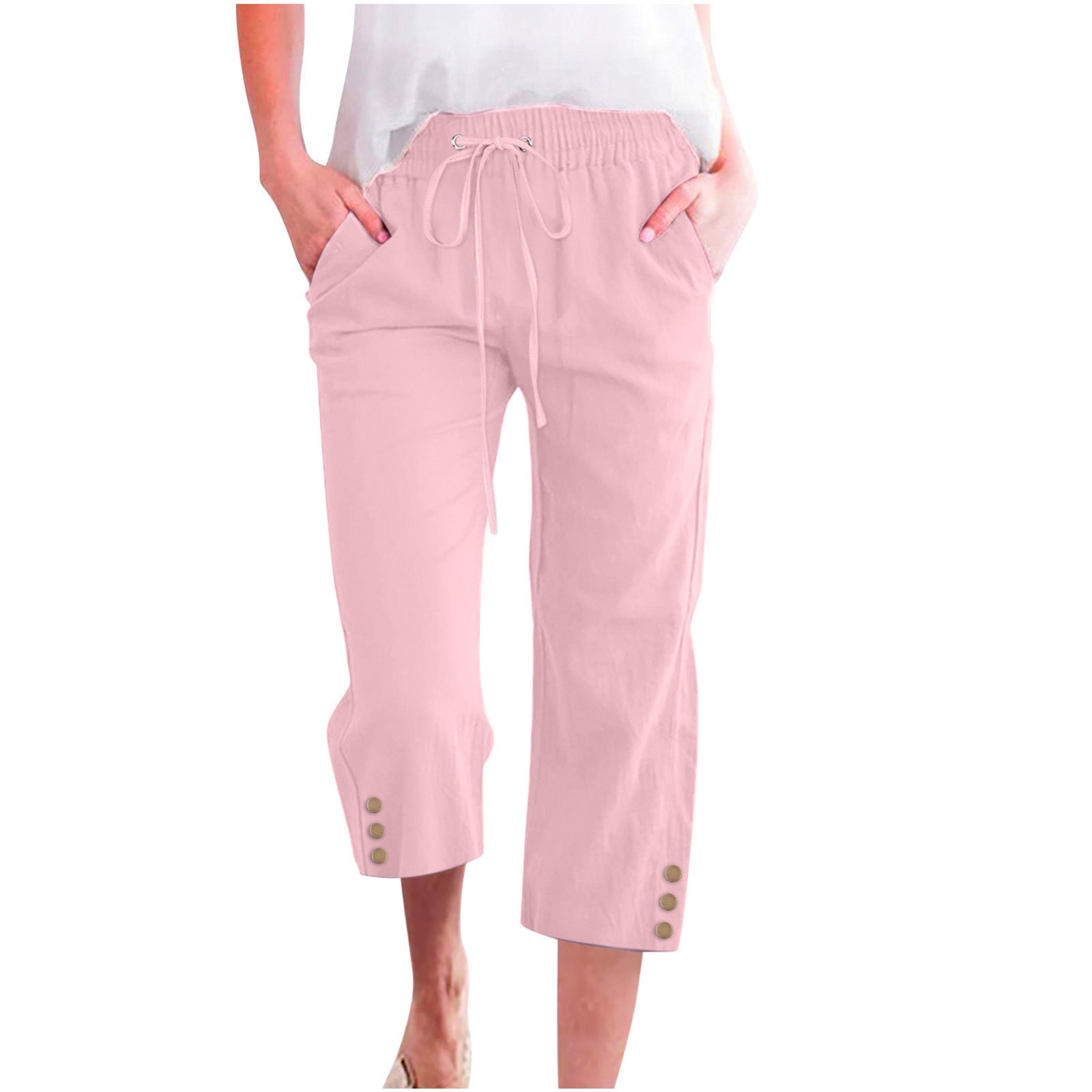 Pink pants with drawstring and buttons on a white background