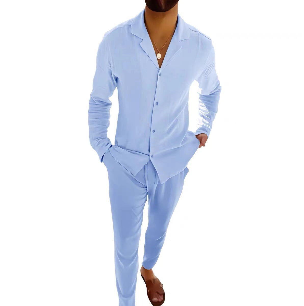 Light blue pajama set worn by a person on a white background