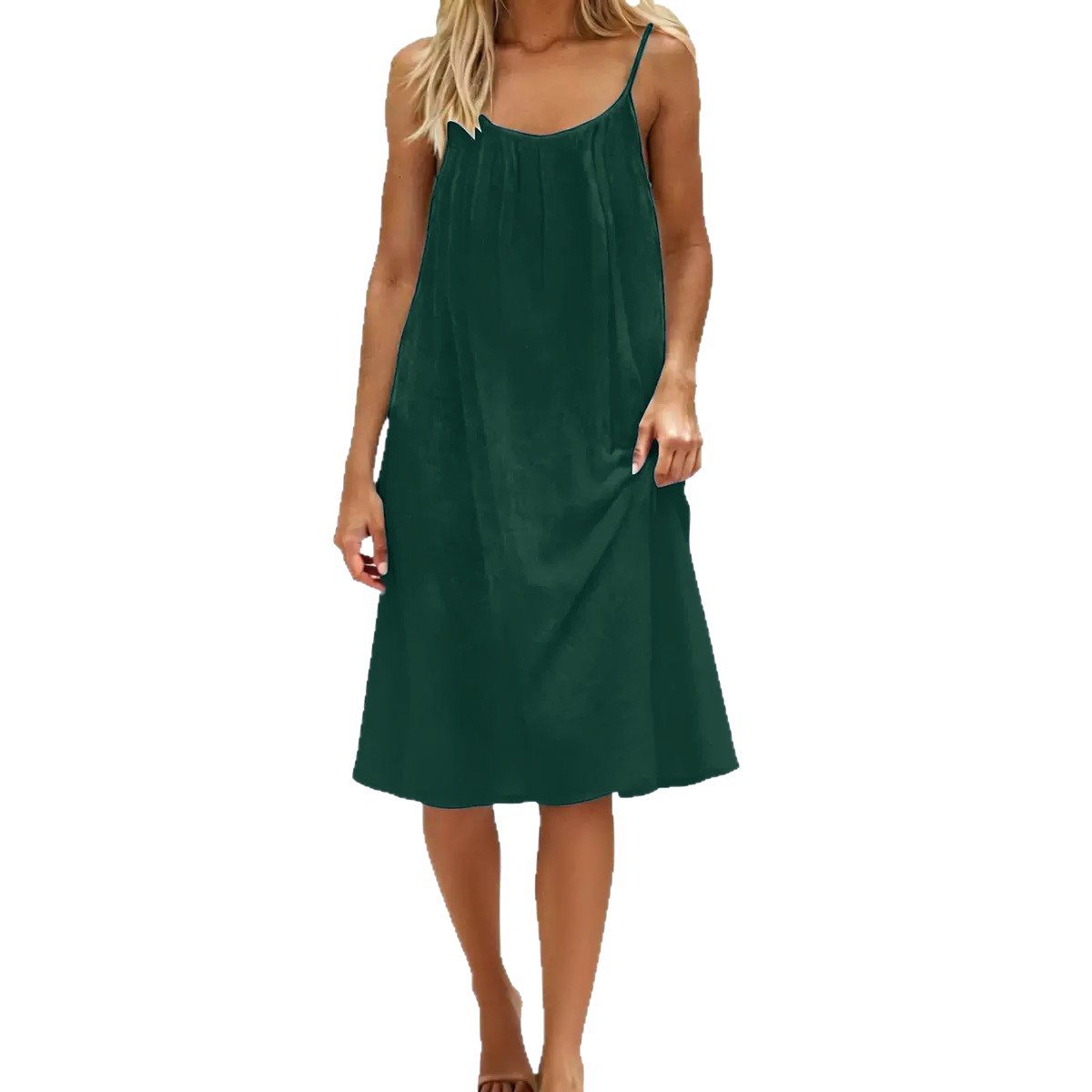 Green dress worn by a model on a white background