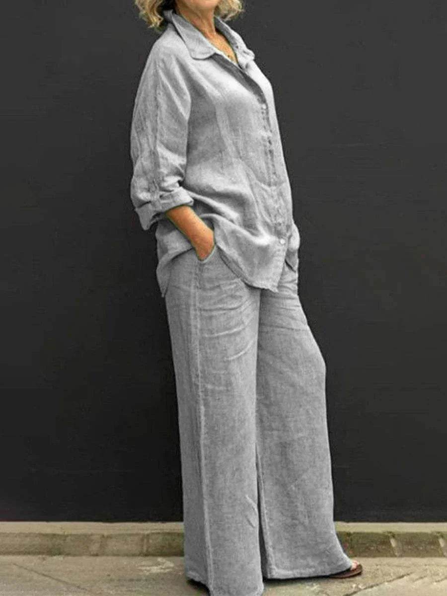Woman wearing loose grey linen shirt and wide-leg pants, ZA-Zola UK fashion apparel