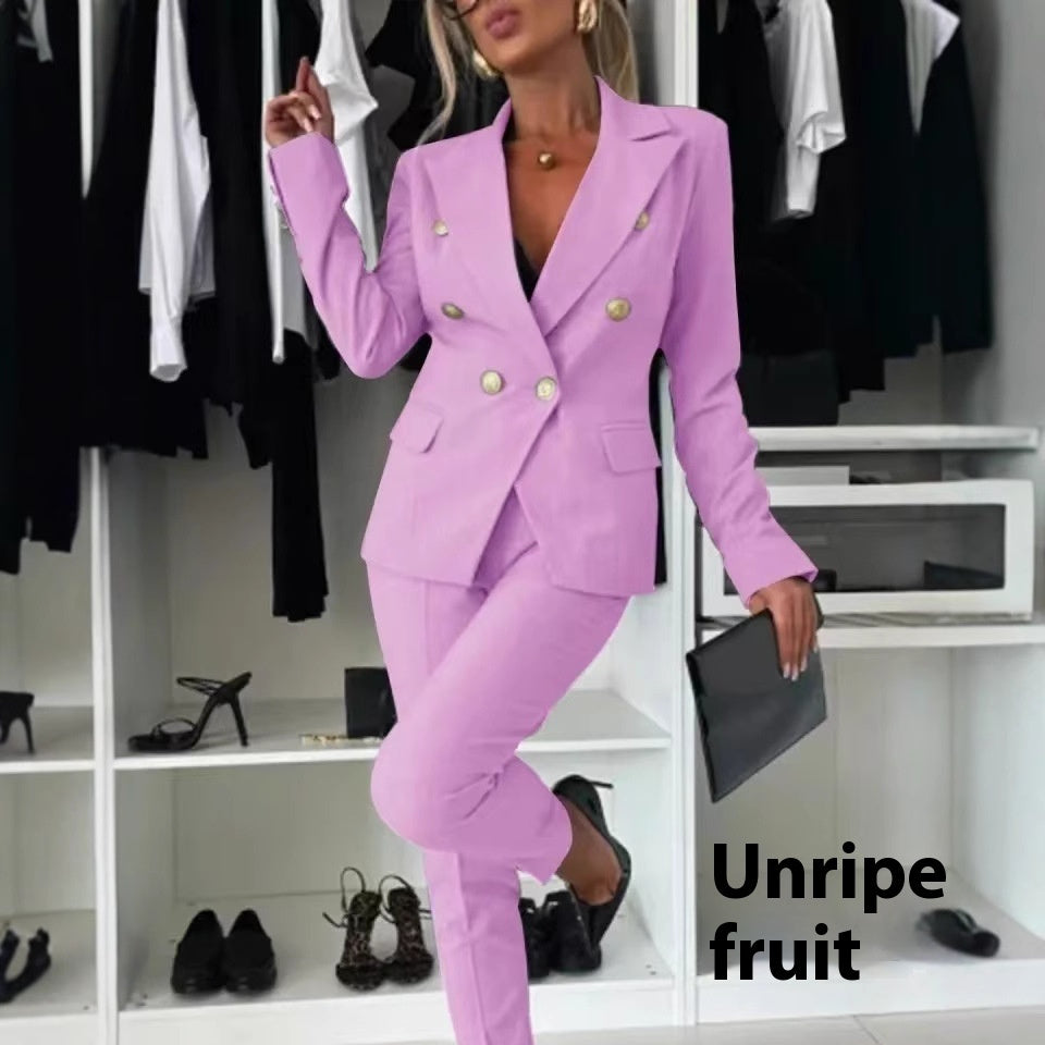 Person wearing a pink suit in a room with shelves and shoes.