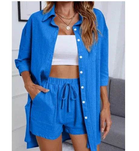 Woman modeling blue button-up shirt and shorts lounge set from ZA-Zola UK fashion collection