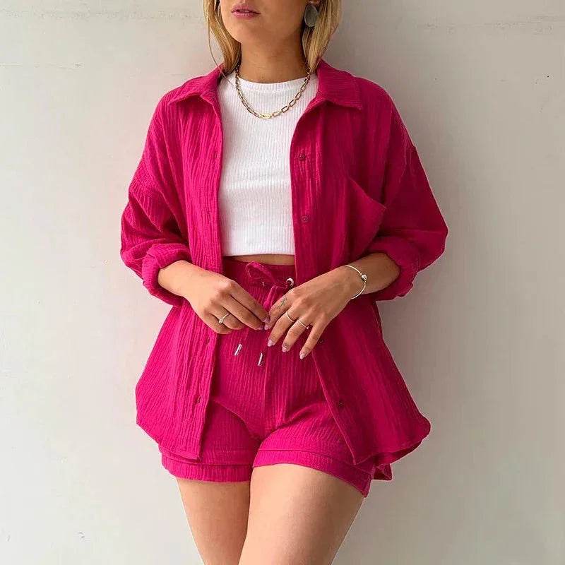 Woman wearing trendy hot pink shirt and shorts set with white crop top, ZA-Zola fashion