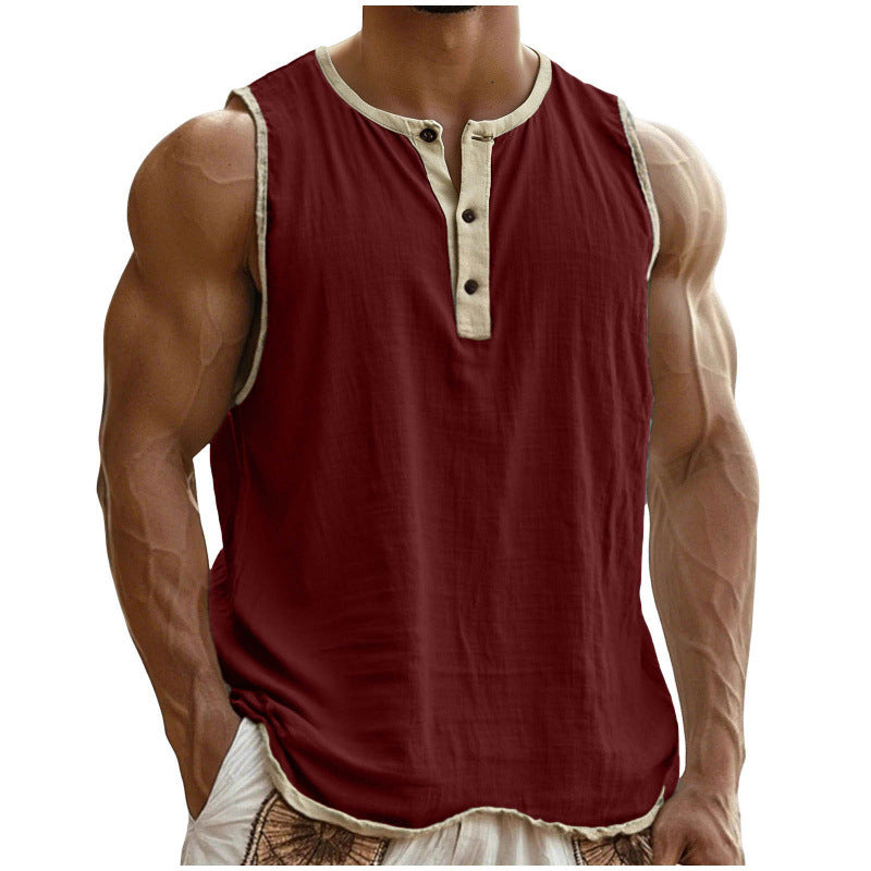 Red sleeveless shirt with beige trim worn by a person on a white background