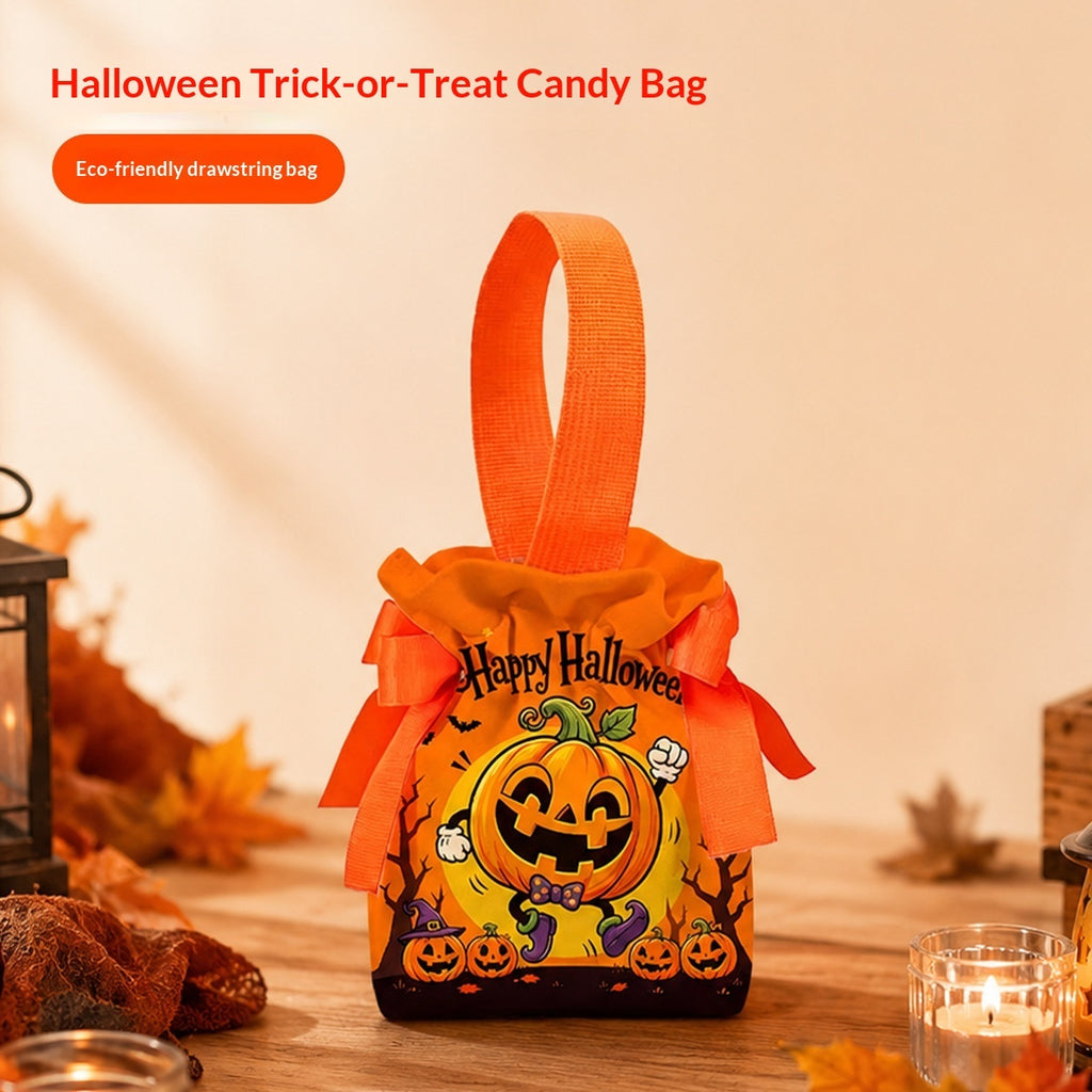 A Halloween trick-or-treat candy bag with a bright orange drawstring handle, orange bow, and a yellow jack-o'-lantern design with 'Happy Halloween' text, displayed on a wooden table with fall decorations and candles.