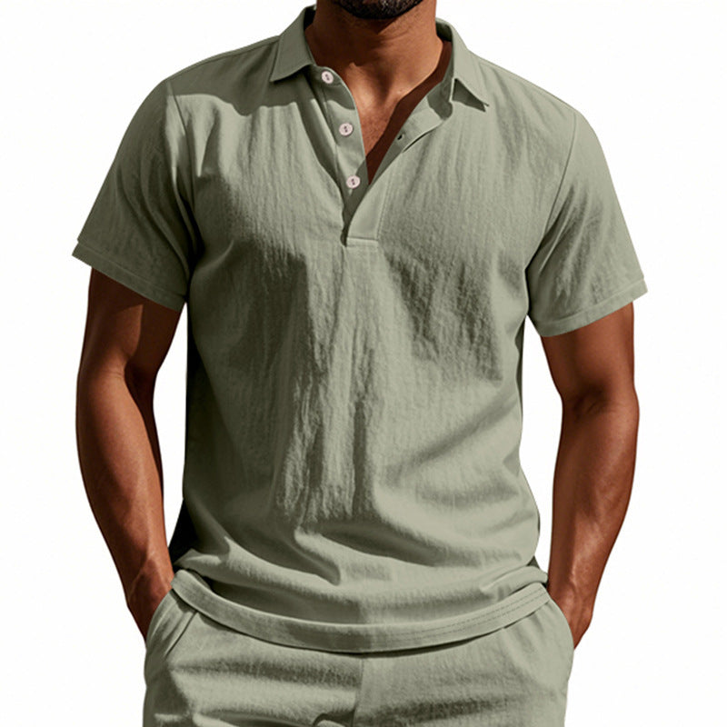 Man wearing a green polo shirt and shorts on a white background