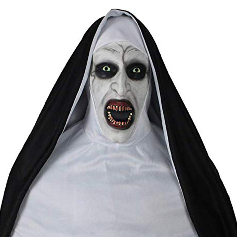 Horror-themed character with white face, black hood, and red mouth on a white background