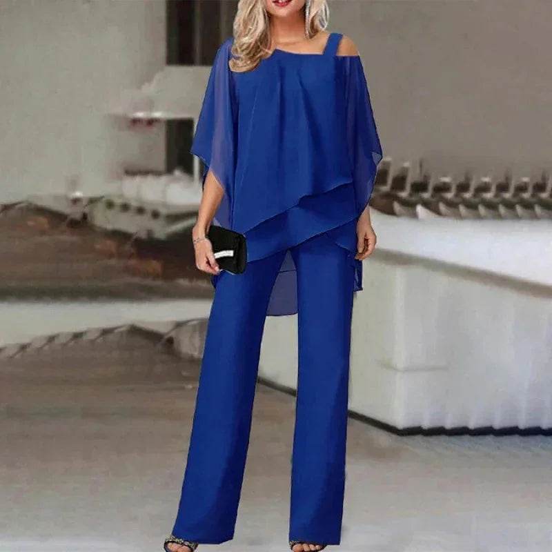 Woman in chic royal blue two-piece pants set with flowy top, stylish fashion ZA-Zola UK