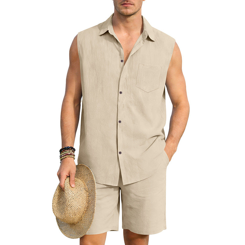 Man wearing a beige sleeveless shirt and shorts holding a straw hat on a white background