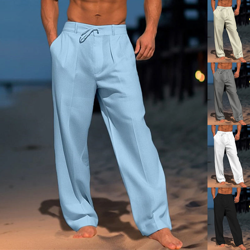 Light blue pants worn by a person on a beach with additional images of gray, white, and black pants.