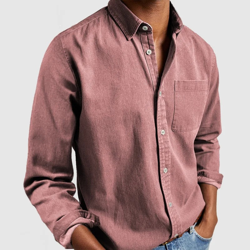 Mauve button-up shirt worn by a person on a light gray background