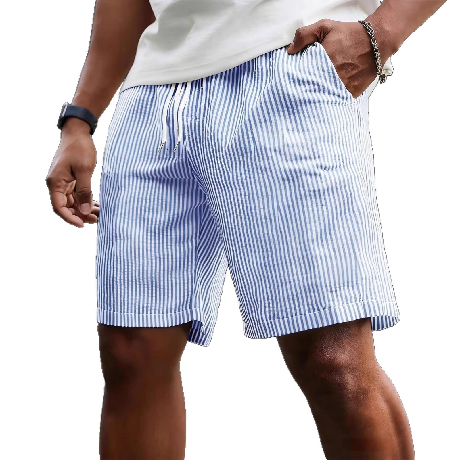 Person wearing blue and white striped shorts on a white background