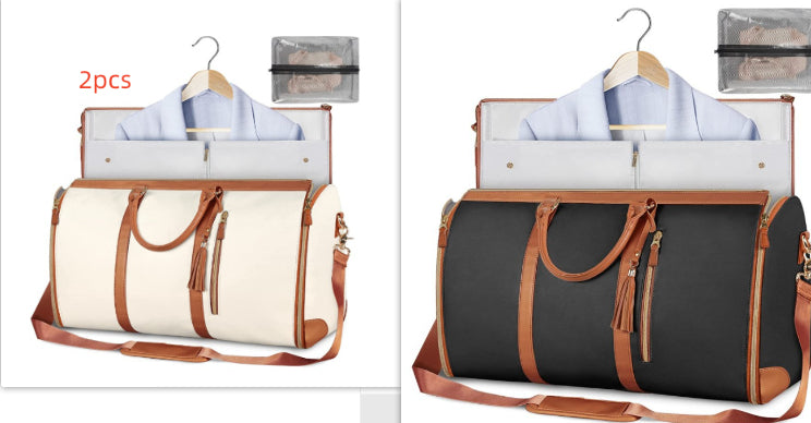 Two duffel bags with hangers and clothes on a white background