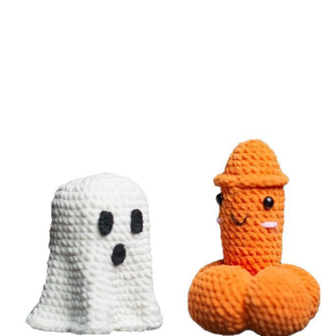 Two small crocheted plush toys on a plain white background: a white ghost figure with black eyes and mouth, and an orange phallus-shaped figure with a smiling face and small pink mouth details.
