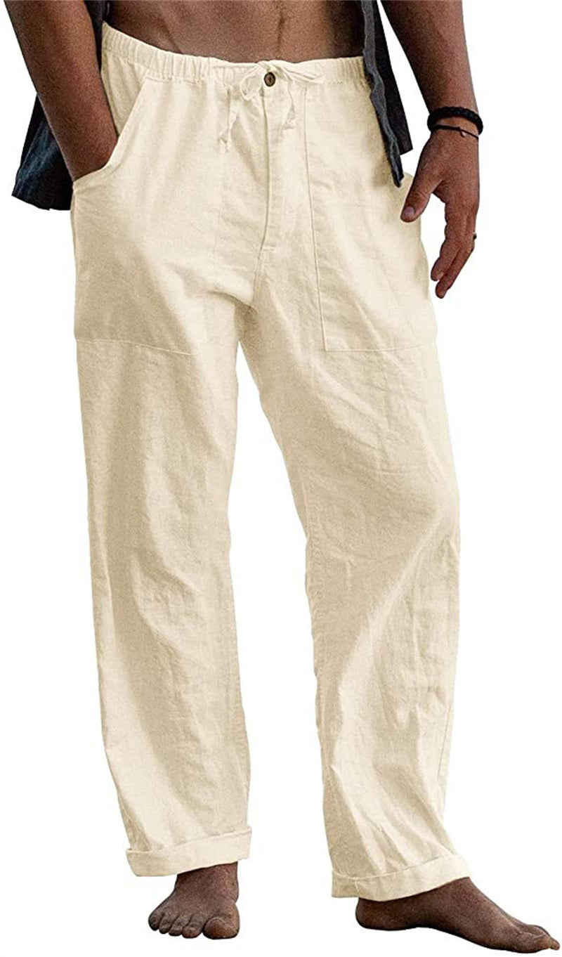 Beige linen pants worn by a person on a white background
